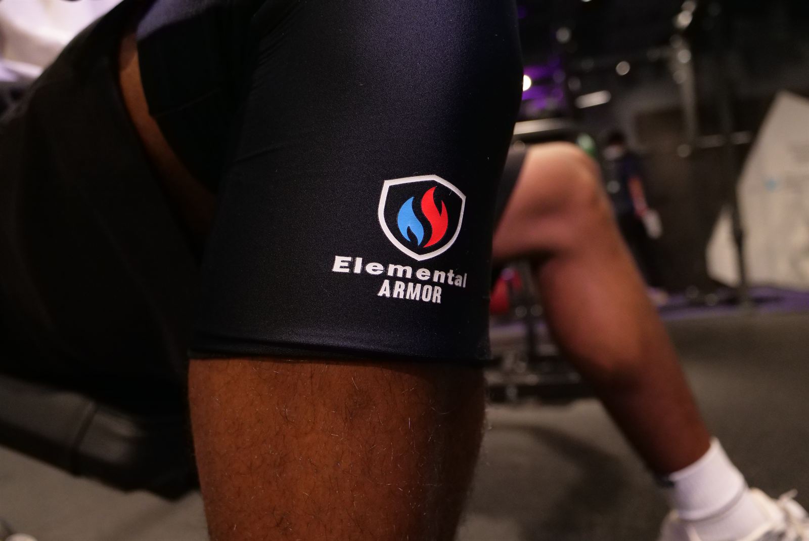 Close-up of the Elemental Armor Knee Sleeve worn in the gym